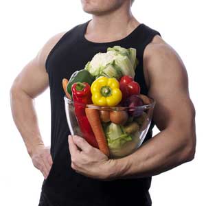 Desportistas que usam fruta e legumes